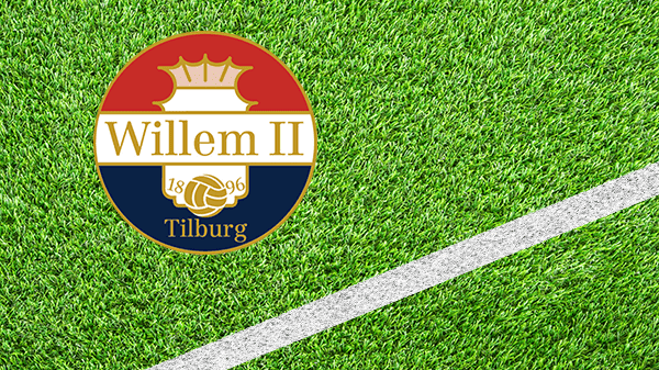 Logo voetbalclub Tilburg - Willem II.png - in kleur op grasveld met witte lijn - 600 * 337 pixels